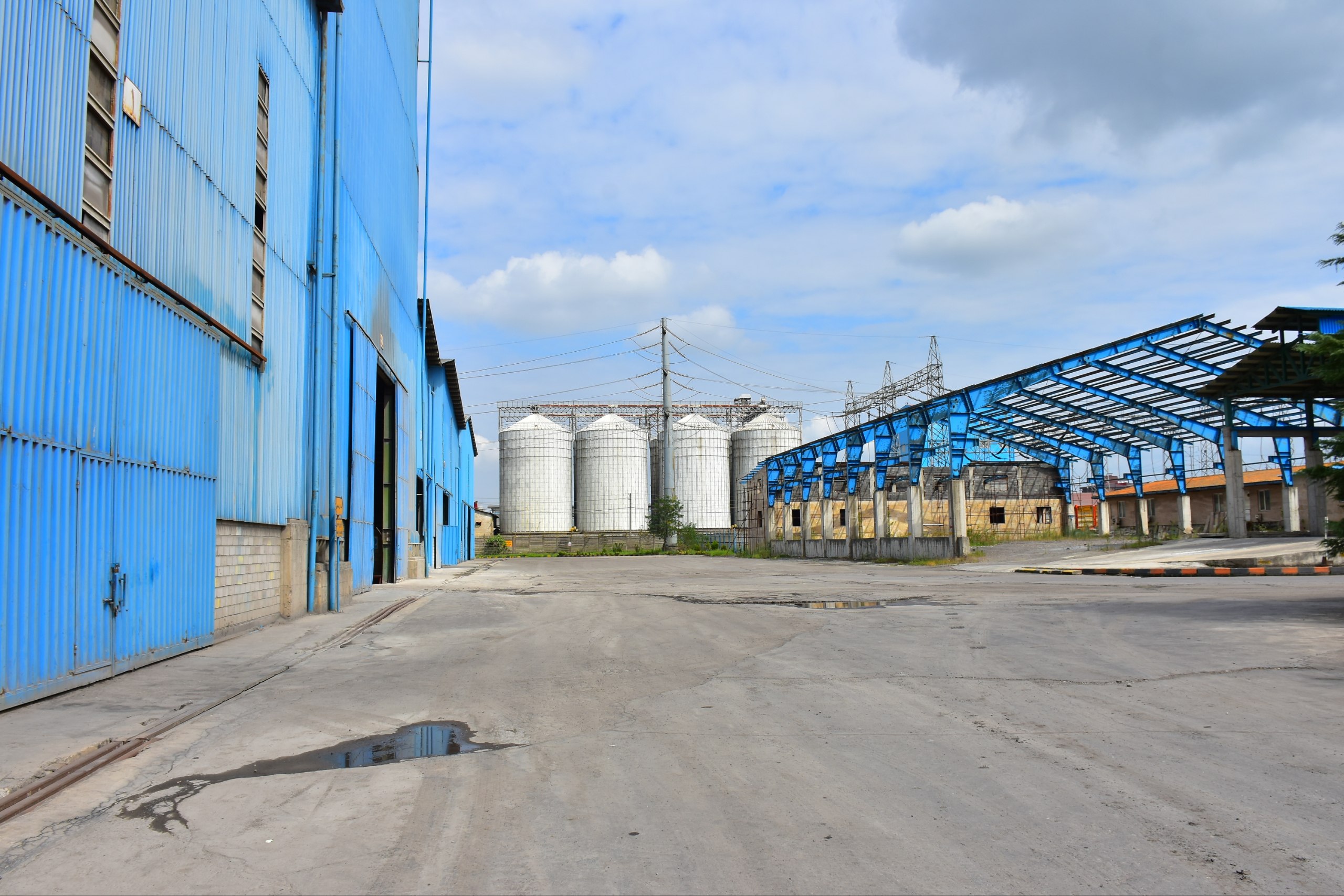 Operators in a control room monitoring production